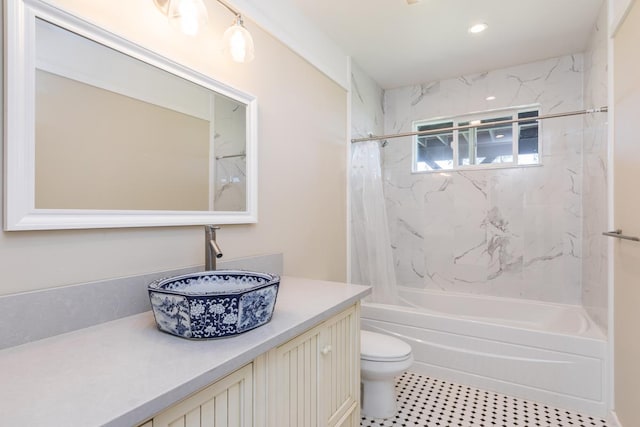 full bathroom featuring toilet, vanity, and shower / tub combo with curtain