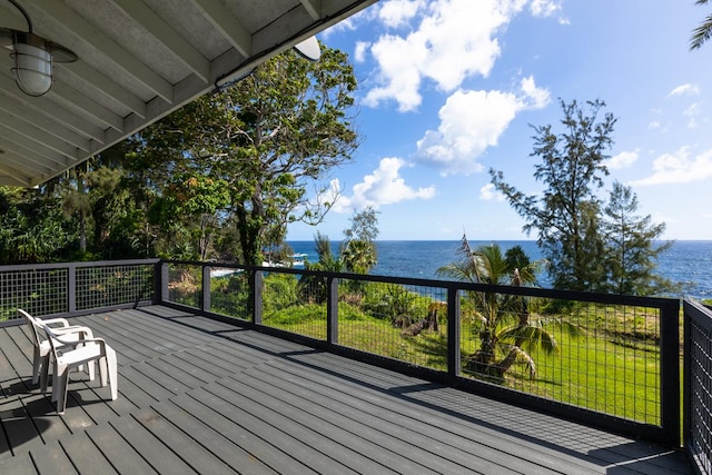 wooden terrace with a water view