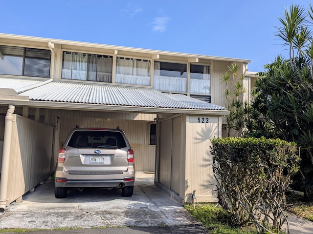 view of front of house featuring a carport