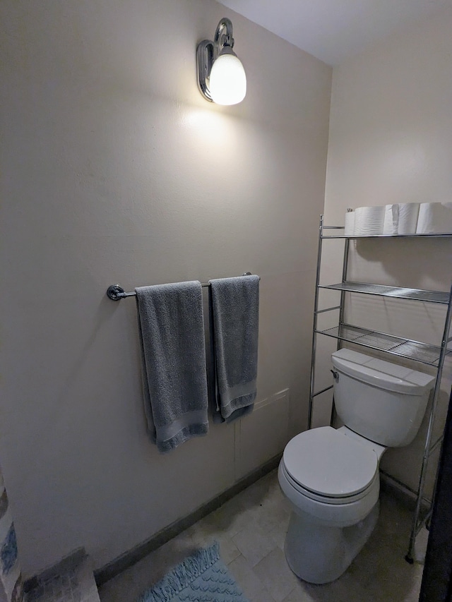 bathroom featuring toilet