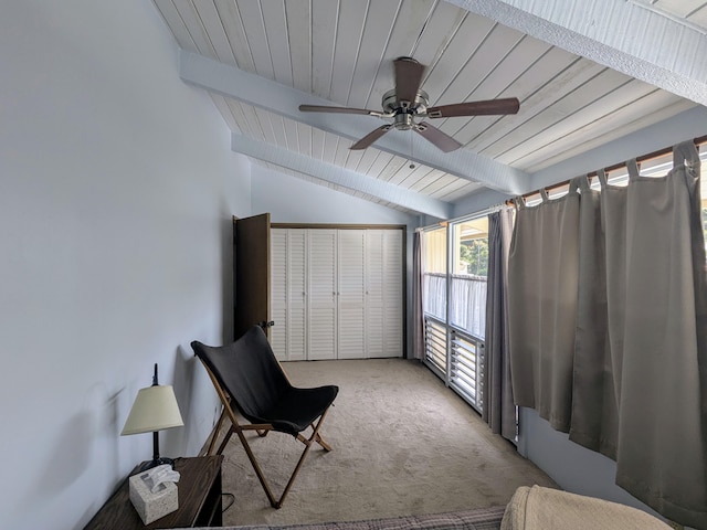 living area with ceiling fan, light colored carpet, and lofted ceiling with beams