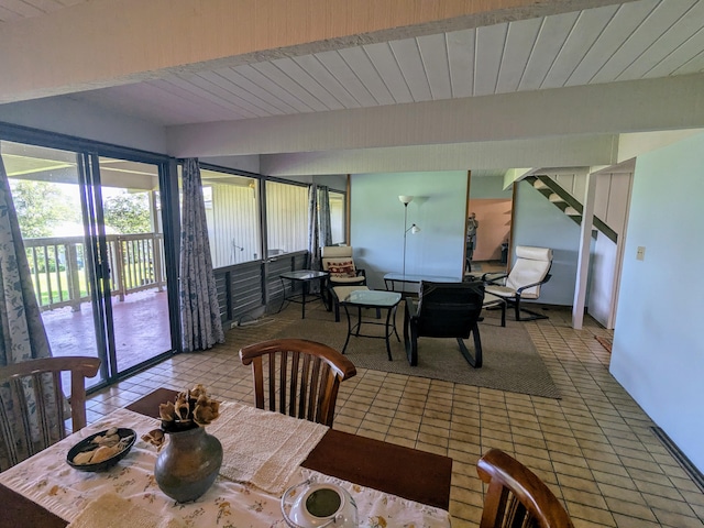 dining room featuring light tile patterned flooring