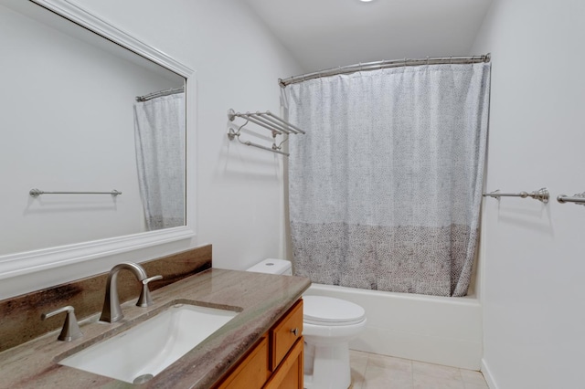 full bathroom featuring tile patterned floors, vanity, toilet, and shower / bath combo with shower curtain