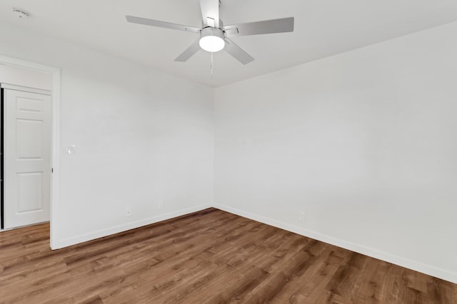 unfurnished room featuring hardwood / wood-style flooring and ceiling fan