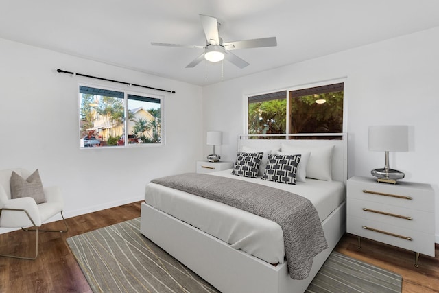 bedroom featuring dark hardwood / wood-style floors and ceiling fan