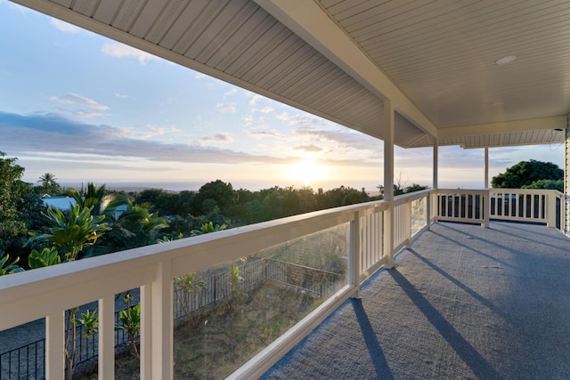 view of balcony at dusk