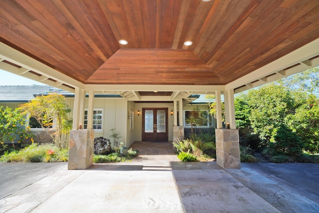 entrance to property with french doors and a patio