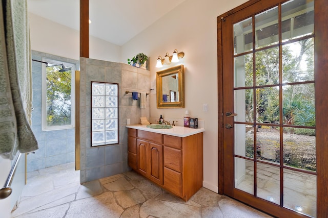 bathroom with plenty of natural light and vanity