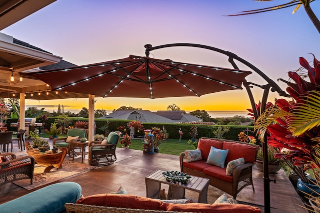 patio terrace at dusk with an outdoor hangout area