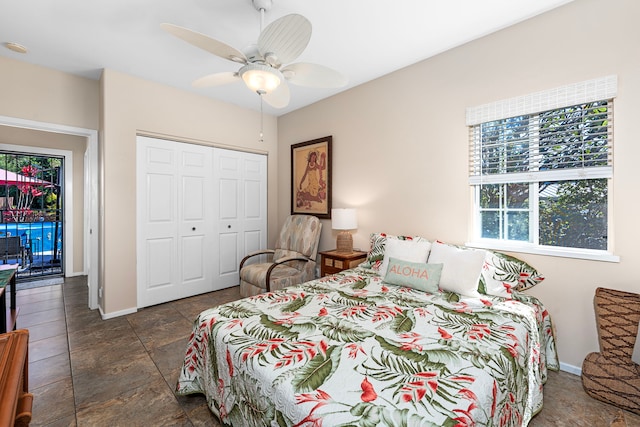 bedroom featuring ceiling fan and a closet