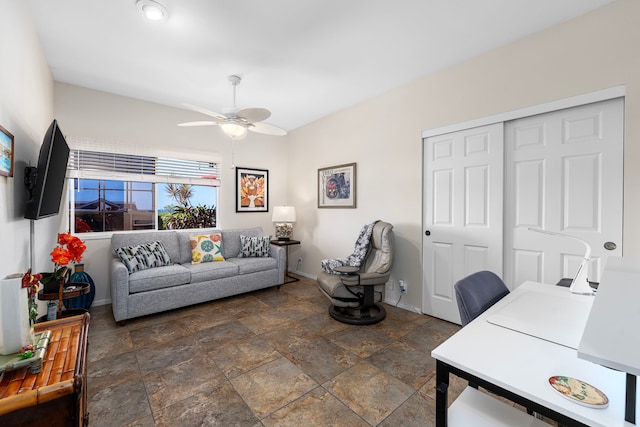 living room with ceiling fan