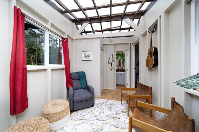 living area with wood-type flooring