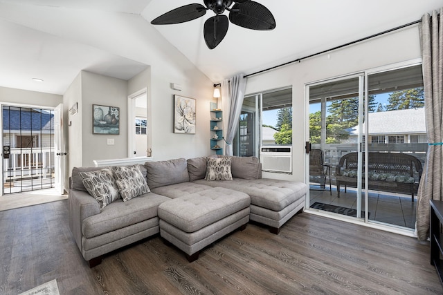 living room with ceiling fan, dark hardwood / wood-style flooring, and lofted ceiling