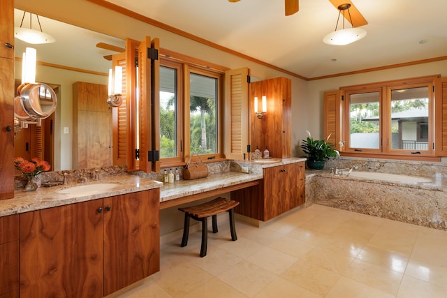 full bathroom featuring ceiling fan, vanity, a bath, and crown molding