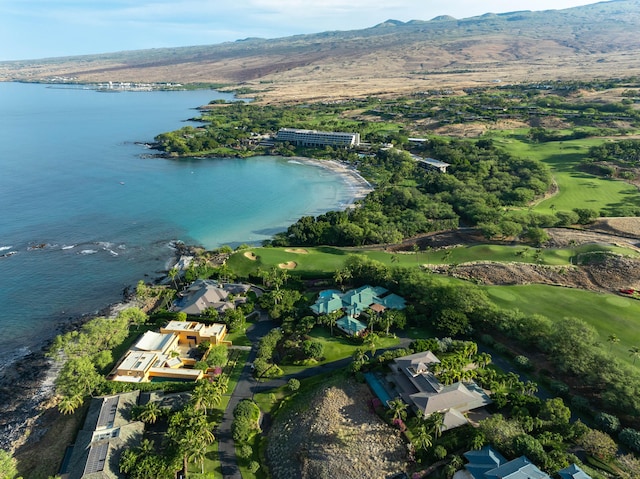 birds eye view of property featuring a water and mountain view