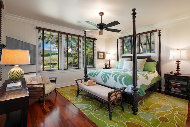 bedroom with ceiling fan, crown molding, and hardwood / wood-style floors