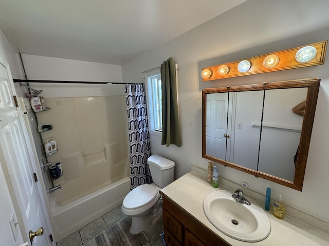 full bathroom featuring tile patterned flooring, shower / bath combination with curtain, vanity, and toilet