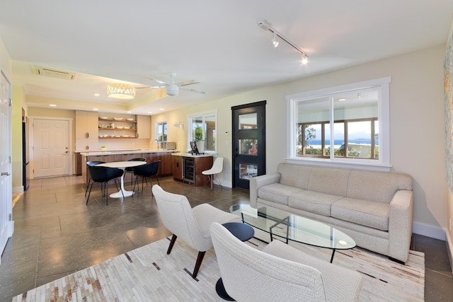 living room featuring ceiling fan