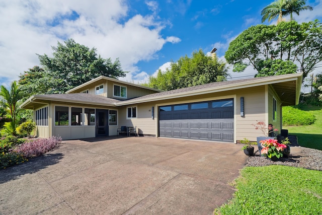 view of front of property with a garage