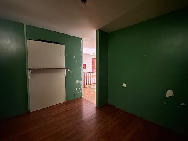 spare room featuring hardwood / wood-style floors