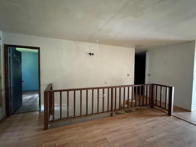 spare room featuring light hardwood / wood-style flooring