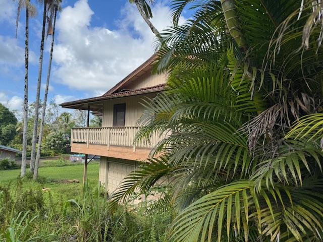 view of property exterior with a balcony