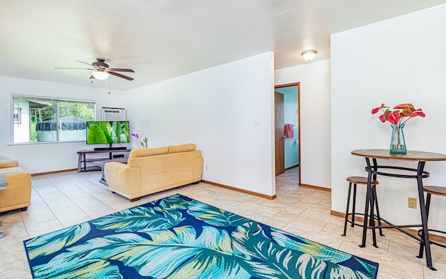 tiled living room with ceiling fan