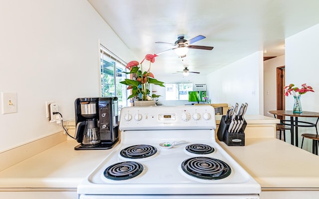 kitchen featuring white electric range oven