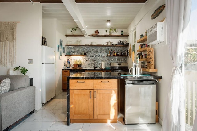 kitchen with backsplash, a wall unit AC, sink, white refrigerator, and fridge