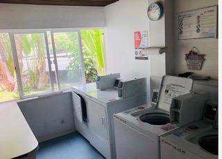 laundry room with plenty of natural light