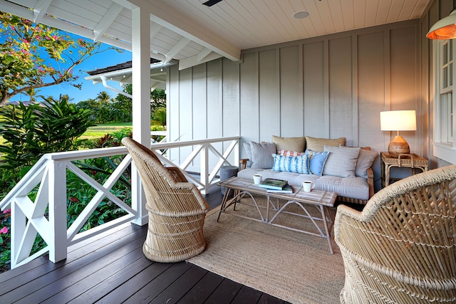 wooden deck featuring an outdoor living space