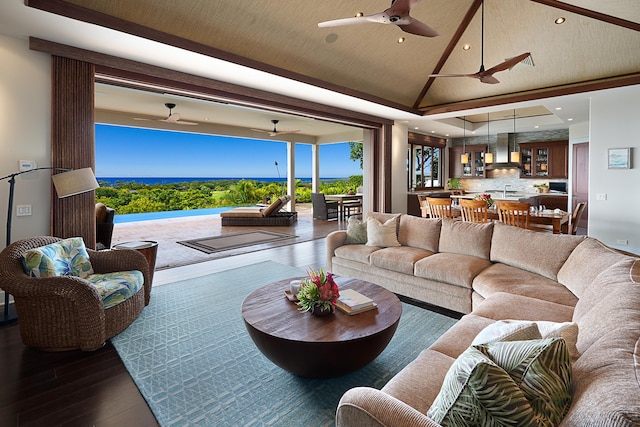 living room with ceiling fan and dark wood-type flooring