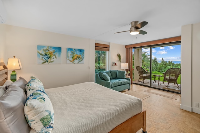 bedroom with access to exterior and ceiling fan