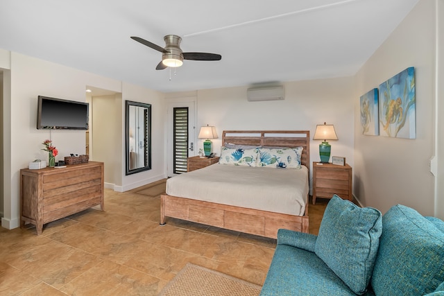 bedroom featuring a wall mounted AC and ceiling fan