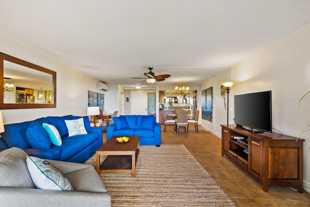 living room featuring ceiling fan with notable chandelier and a wall mounted AC