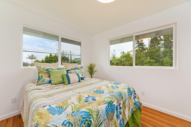 bedroom featuring hardwood / wood-style floors