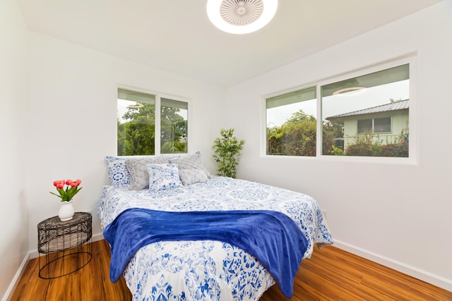 bedroom featuring hardwood / wood-style flooring