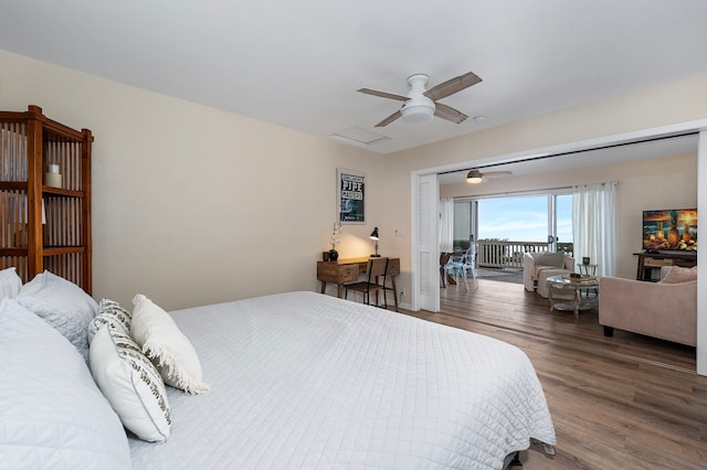 bedroom with hardwood / wood-style flooring and ceiling fan