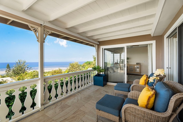 balcony featuring a water view