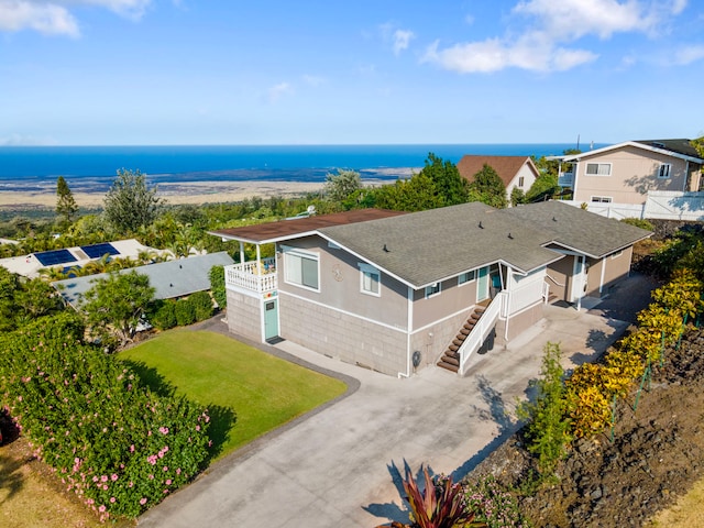 drone / aerial view featuring a water view