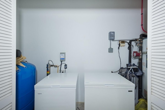 clothes washing area featuring washing machine and dryer