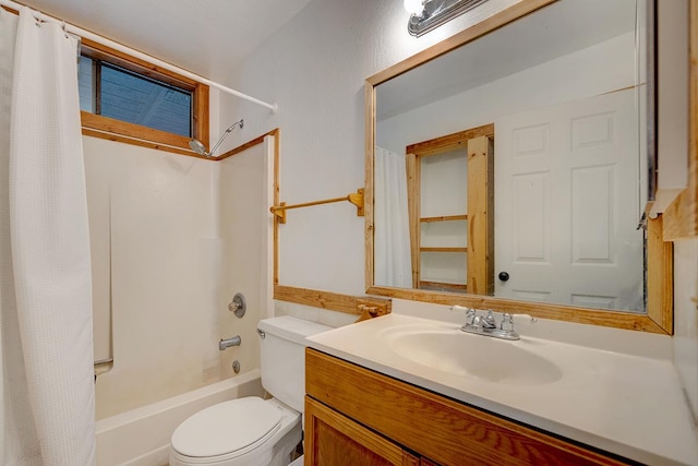 full bathroom featuring shower / bath combo, toilet, and vanity