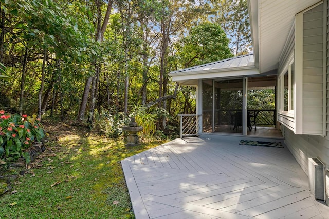 wooden terrace with a sunroom