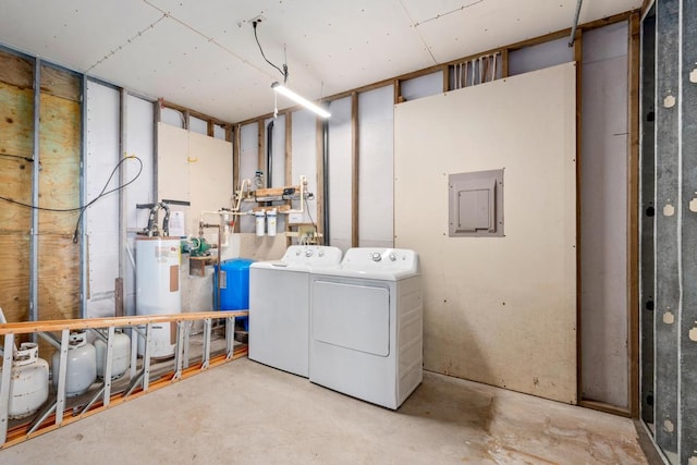 laundry room featuring gas water heater and washer and clothes dryer