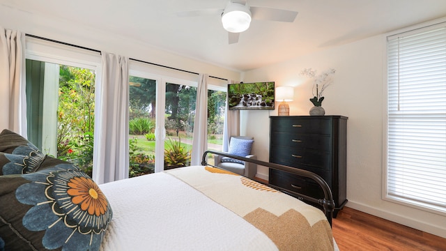 bedroom featuring hardwood / wood-style flooring and ceiling fan