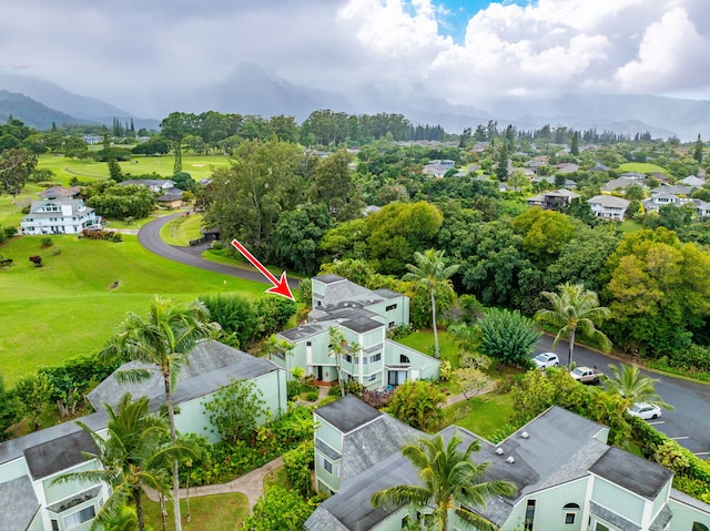 birds eye view of property featuring a mountain view