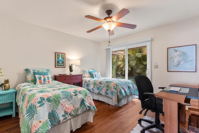 bedroom featuring access to exterior, dark hardwood / wood-style flooring, and ceiling fan