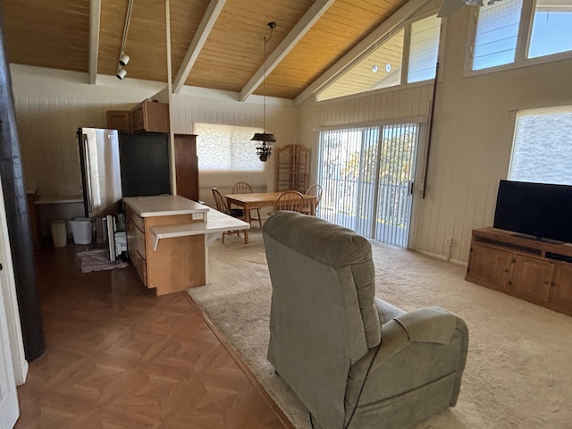 living room with beamed ceiling, high vaulted ceiling, parquet flooring, and wood ceiling