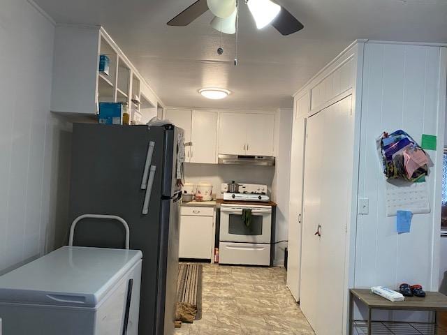 kitchen featuring fridge, white cabinetry, white electric stove, and ceiling fan