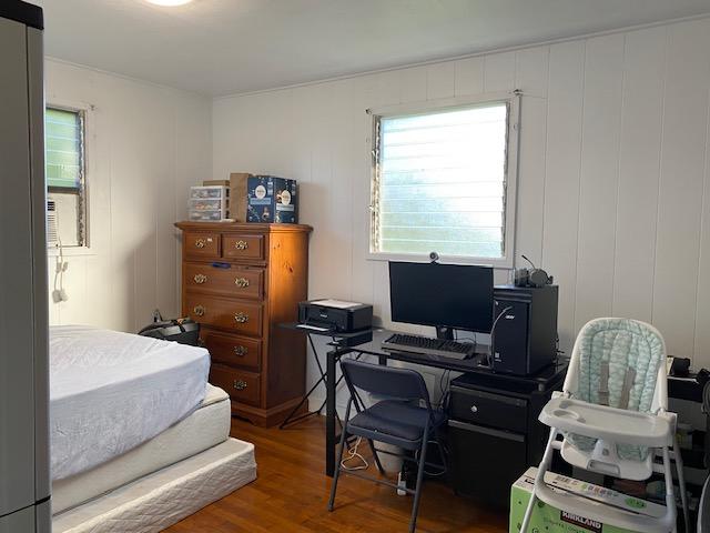 bedroom featuring hardwood / wood-style floors